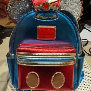 Loungefly dumbo attraction Red and Gold Mini Backpack